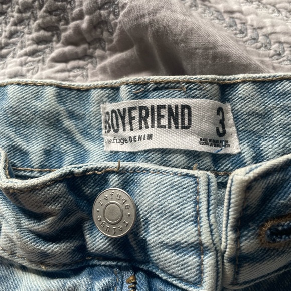 light blue jean shorts, torn fabric - Picture 2 of 3